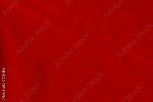 Dark red velvet fabric texture used as background. silk color scarlet fabric background of soft and smooth textile material. crushed velvet .luxury dark tone for silk.