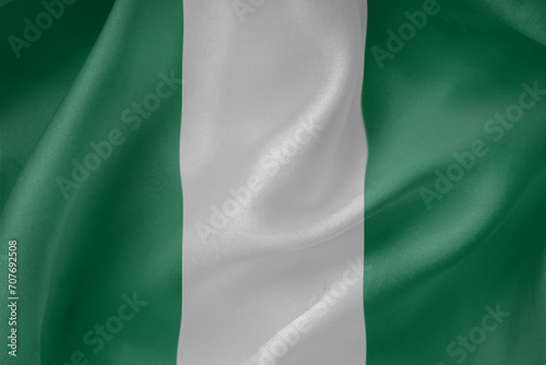 Nigeria waving flag close up fabric texture background