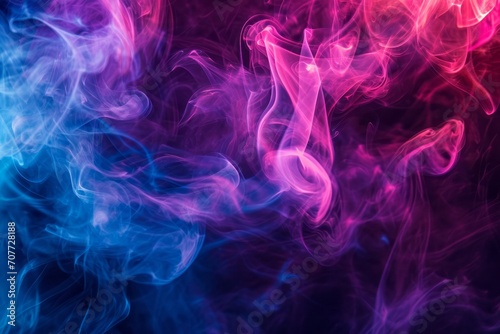 A cloud of smoke fills the frame, with pink and blue colors blending together. The background is a black surface.