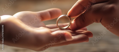 Bridal couple giving wedding rings
