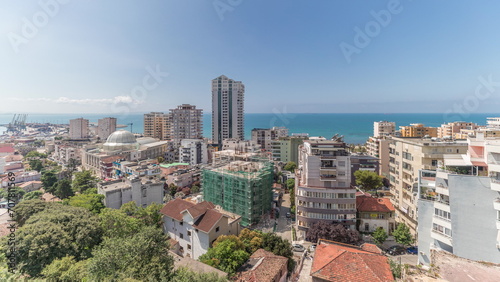 Panorama showing aerial view of city center and the harbor of Durres timelapse from viewpoint, Albania.
