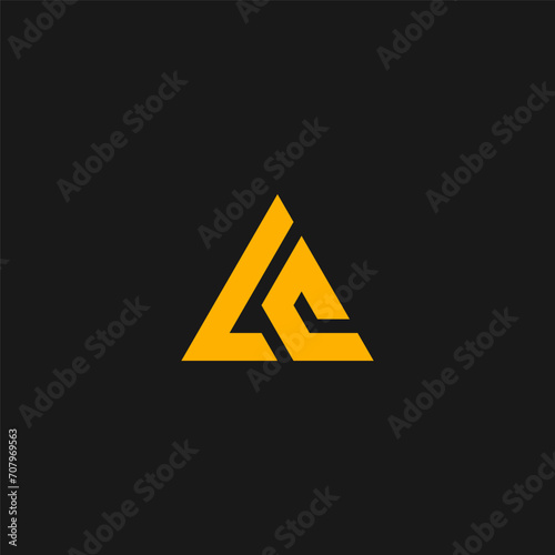 LC monogram logo in triangle shape with yellow color. L and C