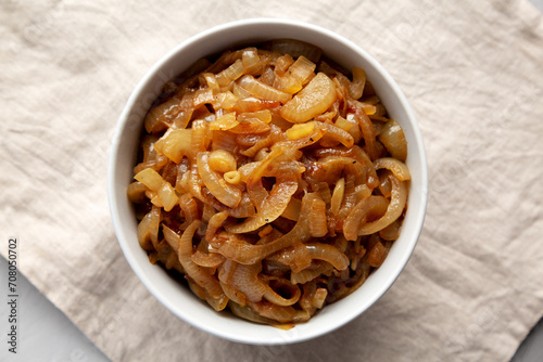 Organic Caramelized Onions in a Bowl, top view. Flat lay, overhead, from above.