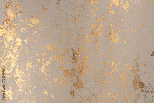 Crumble Paper texture painting glow glitter blot wall. Abstract gold, nacre and beige stain copy space background.