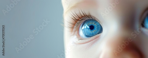 Beautiful baby's eye, Blue eye, macro, spaca for text. AI generated image. 