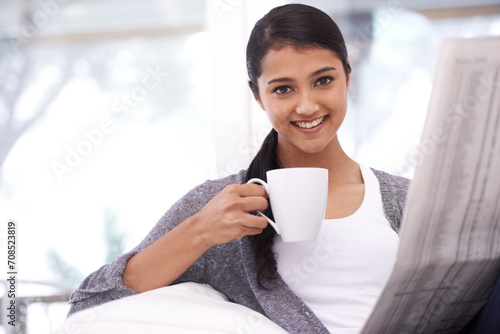 Woman, portrait and newspaper in a home in the morning with story, article and news. Relax, student press print and calm happy person from India with paper publication in a house with information