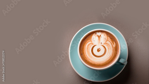 Frothy cappuccino in a blue coffee cup on a light background. Cafe.