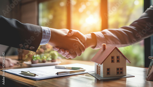  The real estate agent discussed the home purchase terms and requested the customer to sign the documents to finalize the contract legally. This relates to the sale and insurance of homes