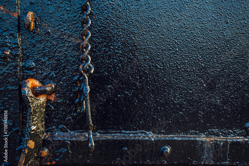 Detail of lock with chain of metal door in Red Hook, Brooklyn, New York