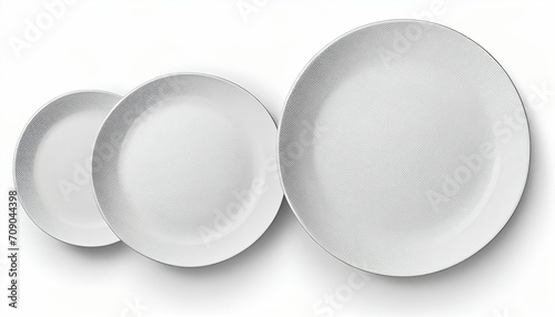 Isolated top view of empty circular plates against a white background