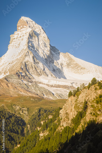 A sunrise view of the Matterhorn peak and glacial valley