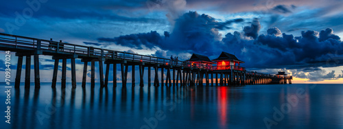 famous old bridge in florida - travel concept of famous pier near naples in florida usa at sunset - travel concept