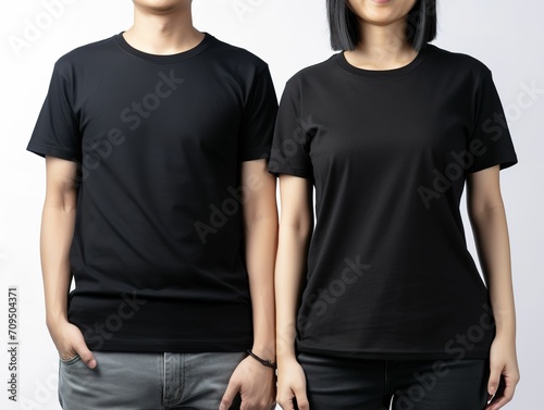 Man and woman wearing black t-shirts, couple style black t-shirt mockup, faceless male and female female models showing black t-shirts on white background, mockup template for design print