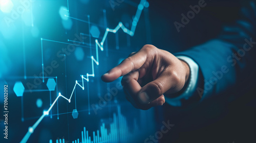 businessman or investor or manager pointing finger to growth financial plan diagram graph, using data for analysis business, metaverse technology