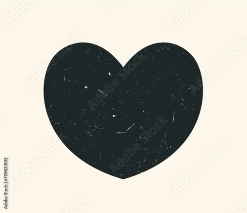 Isolated heart with texture pattern, scratches and abrasions. Graphic design element in a minimalist, grange motif. Black heart shape, texture board on a white background. Stylish vector illustration