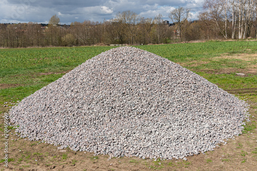 A big pile of stones on the ground outdoors