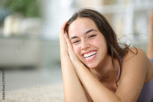 Happy woman at home with perfect smile