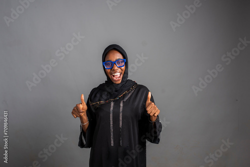 African happy Muslim smiling lady