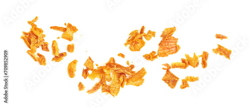 Pile of crispy fried onions isolated on white. Roasted Onions Top view. Flat lay.