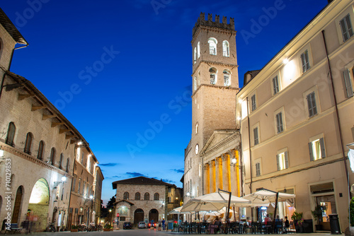 Assisi, Umbria, Italy - Square Piazza del Comune at dusk with tower Torre del Popolo and Temple of Minerva