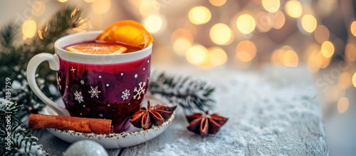 Winter greetings with a delicious cup of mulled wine.