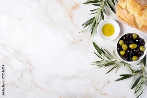 Testing fresh olive oil on white marble background directly above