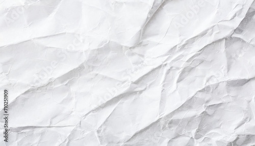 The white crumpled paper background.