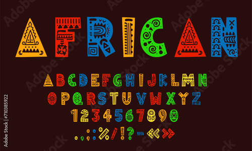 African font, tribal type, ethnic typeface, native english alphabet. Africa ornate font typeset letters and digits, English ABC, alphabet vector numeral, punctuation symbols with tribal ornaments