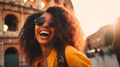 Young black woman in sunglasses taking selfie portrait on city street. Female having fun on vacation outdoor in front of the colosseum, Rome, Italy. Generative AI