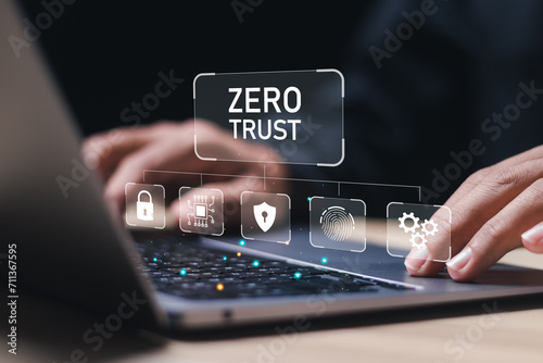Zero trust security concept, Businessman use laptop with virtual zero trust icon for business information security network.