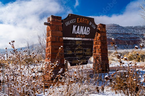 Kanab City Sign with cloud covering the snow mountain.