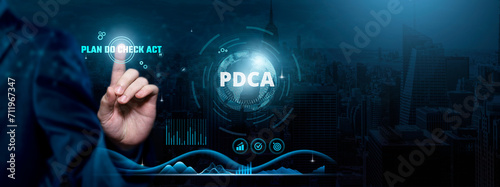 PDCA (Plan-Do-Check-Act), Continuous Improvement, Iterative Processes, Businessman touch PDCA-related text on the global network cyberspace, technology, and innovation concept.