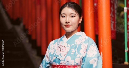 Woman, Japanese and portrait in traditional kimono at culture temple for Tokyo, worship or spiritual. Female person, face and shinto building for heritage history dress for peace, buddhism or local