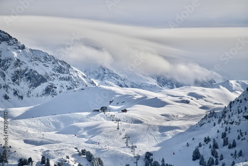 Ski resort in French alps by winter with its amazing slopes 