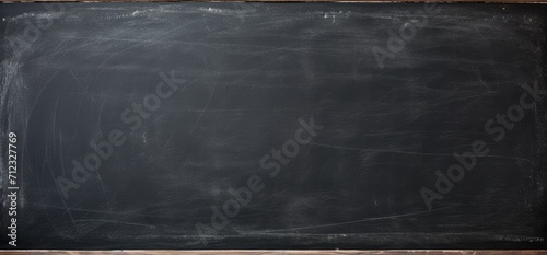 Blackboard background abstract texture of chalk rubbed out dark wall