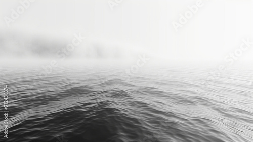 A minimalist splash of monochrome, with various shades of gray creating a subtle yet impactful wave, like a misty morning fog rolling over a calm lake, abstract background