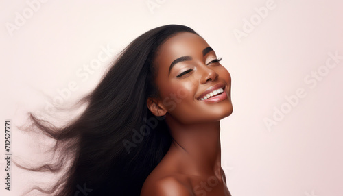 Radiant Beauty: Happy African American Woman's Portrait with Attractive Features - Banner of Natural Elegance, Joyful Lifestyle, and Fashionable Afro-Curly Hairstyle