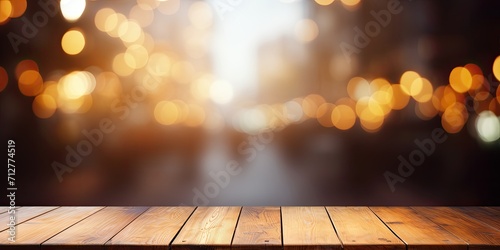 Blurred background with empty wooden table in front.