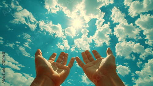 Prayer. A petition from God. Hands are turned towards the sun.