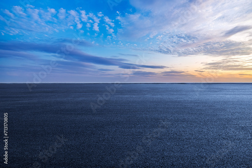 New asphalt road and sky clouds background
