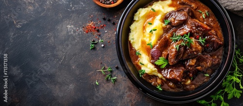 Fried Liver bacon in onion gravy with mashed potato. Copy space image. Place for adding text