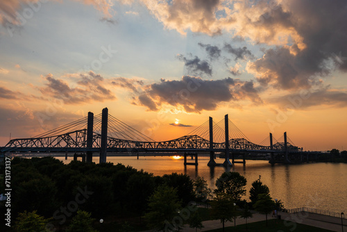 The Abraham Lincoln Bridge crosses the Ohio River that connects Kentucky and Indiana for motor vehicles.