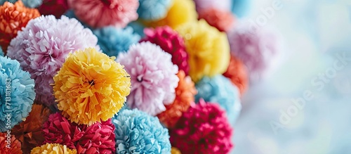 Bright party honeycomb pom pom decorations. Copy space image. Place for adding text