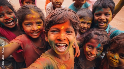 Indian kids playing Holi in India. Holi is the festival of colors.