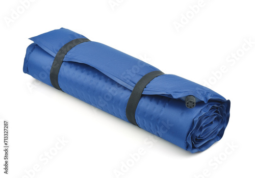 Rolled blue self-inflating camping mat