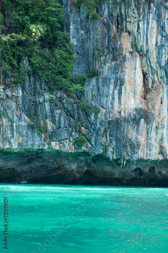 Unique and beautiful cliff texture in Maya Bay, Phuket, Thailand. crystal clear sea water. 