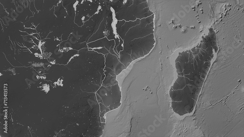 Mozambique outlined. Grayscale elevation map