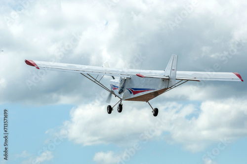 Experimental single-engine plane taking off shown from the back