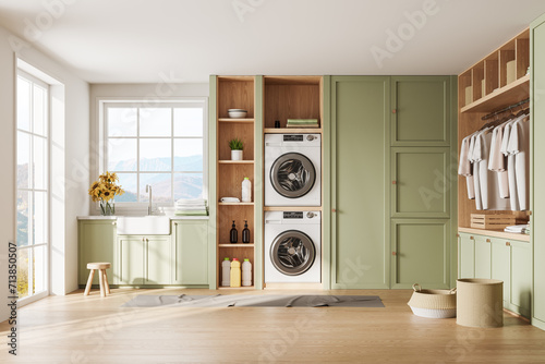 White and green laundry room interior