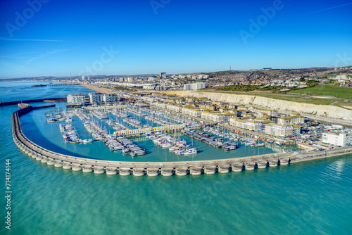 Brighton Marina in East Sussex, Southern England, with chalk cliffs and Brighton City in the background, Aerial photo from the sea.